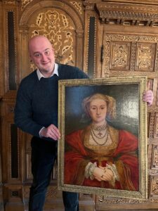 Dr Owen Emmerson with a portrait of Anne of Cleves